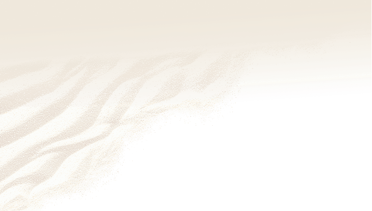Soft white sand with gentle ripple patterns on beach