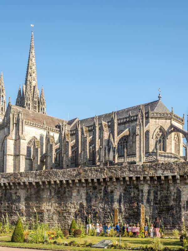 view at the cathedral of saint corentin in the streets of quimper in france